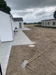 belægning omkring hus